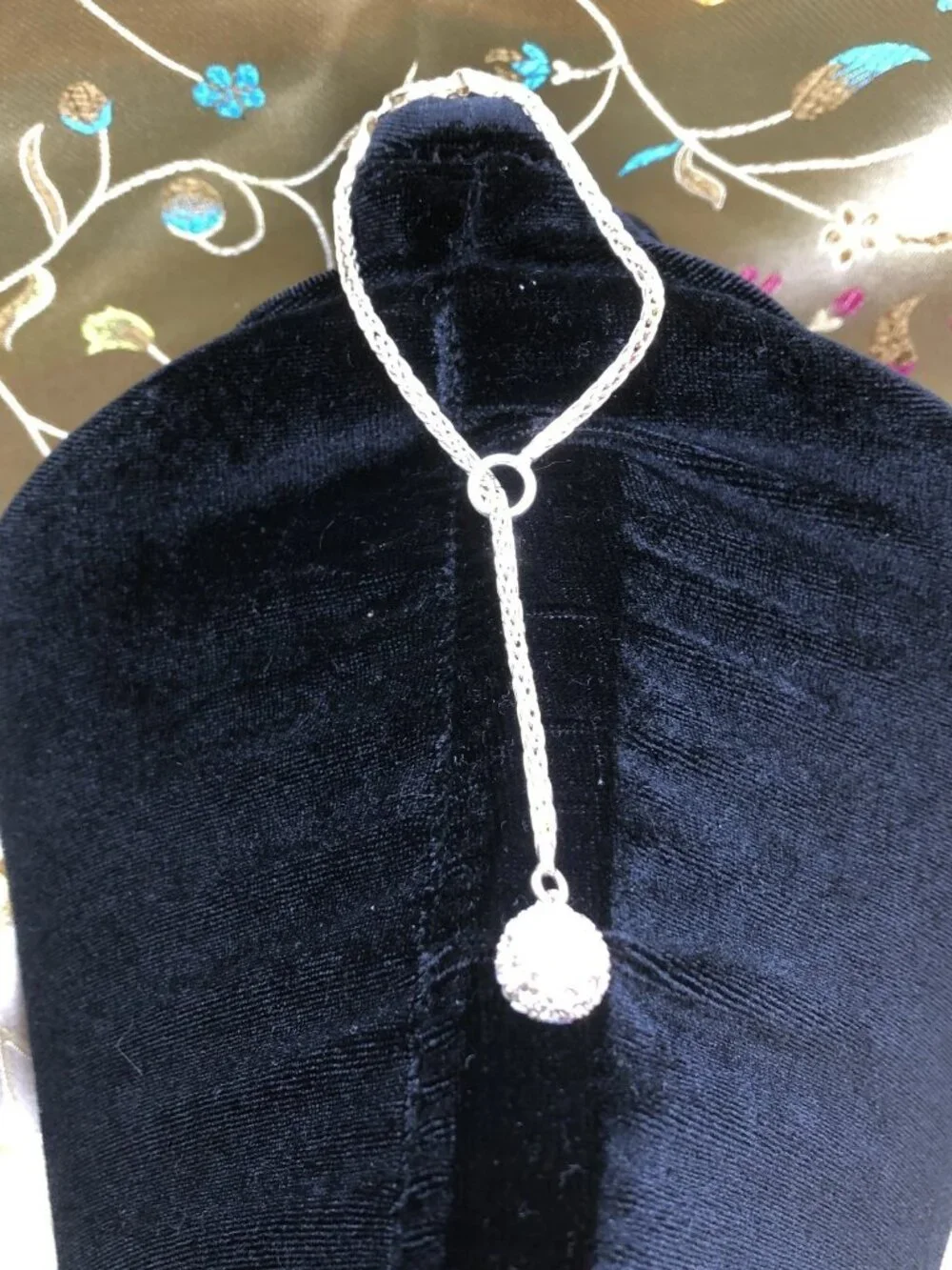8 inch sterling silver lariat slide bracelet with rhinestone glitter ball. 8+ gr